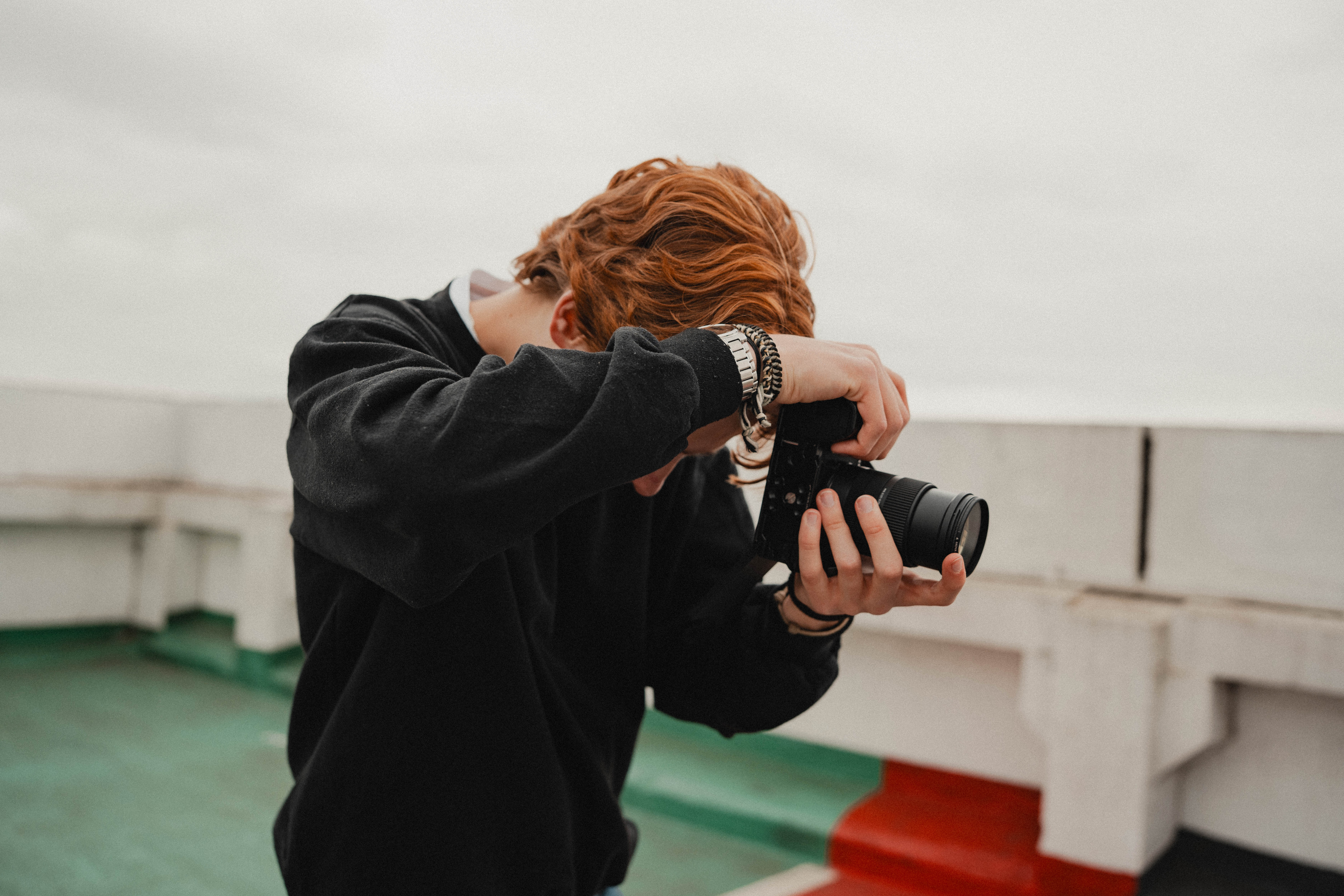 Bryce working behind the scenes with a camera